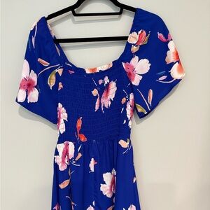 Royal blue floral dress. Above knee length. Can be worn on or off shoulders